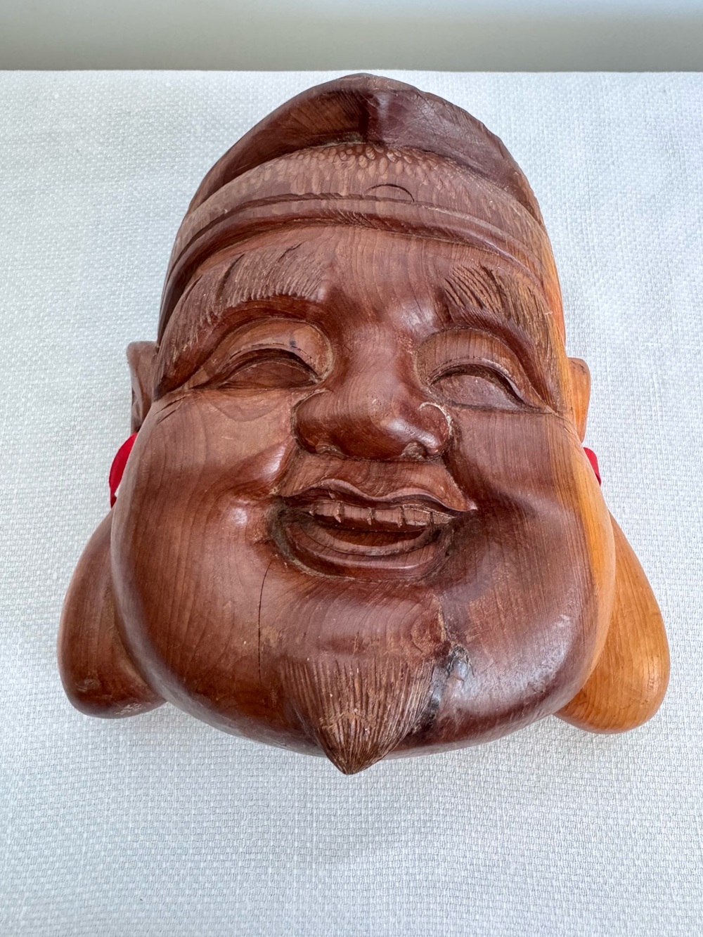 Hand-carved Wooden Laughing Buddha Wall Mask - Hoitei - Picture 1 of 4